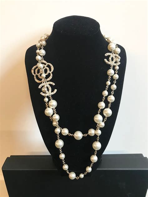 black chanel logo necklace|Chanel pearl necklaces for women.